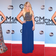 Illustration for article titled Sparkles, Slinky Dresses and Big Hair at the CMA Awards